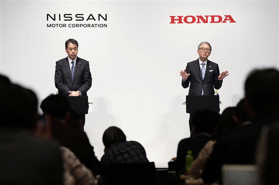 Honda, Nissan in talks to set up holding company, source says