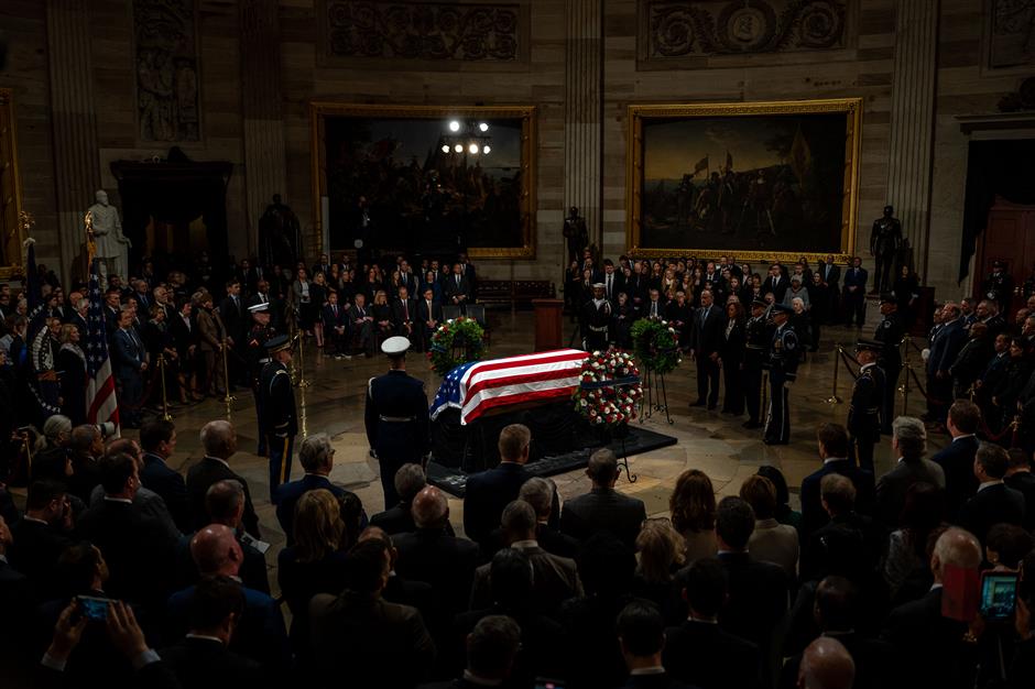 Former US President Carter lies in state after somber Washington procession