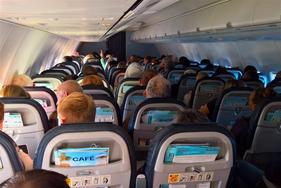 'Nickel-and-dimed:' Airline passengers vent frustration over cabin seating