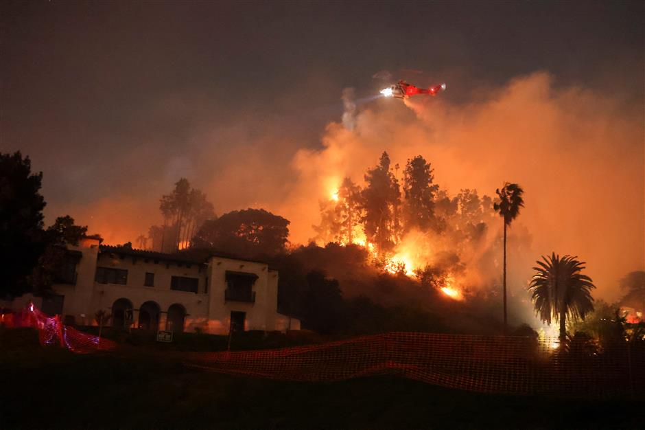 California fires: Hollywood Hills burn as LA engulfed by 'the big one'